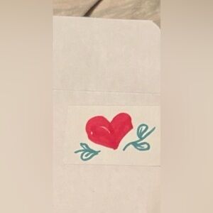 White Envelope with Red Heart Design & Esposo hand drawn in Los Angeles ca.
